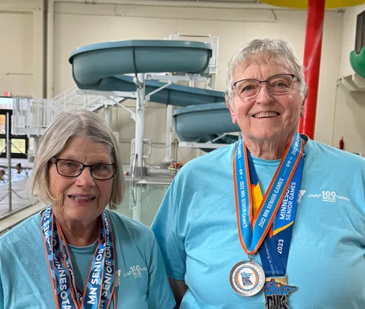 2 women completing the 100-Mile Swim Challenge